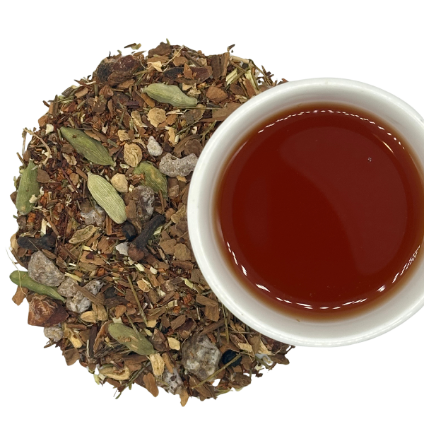 Caffeine-free Rooibos Chai loose-leaf tea with spices, brewed in a cup — Dragon Girl Tea