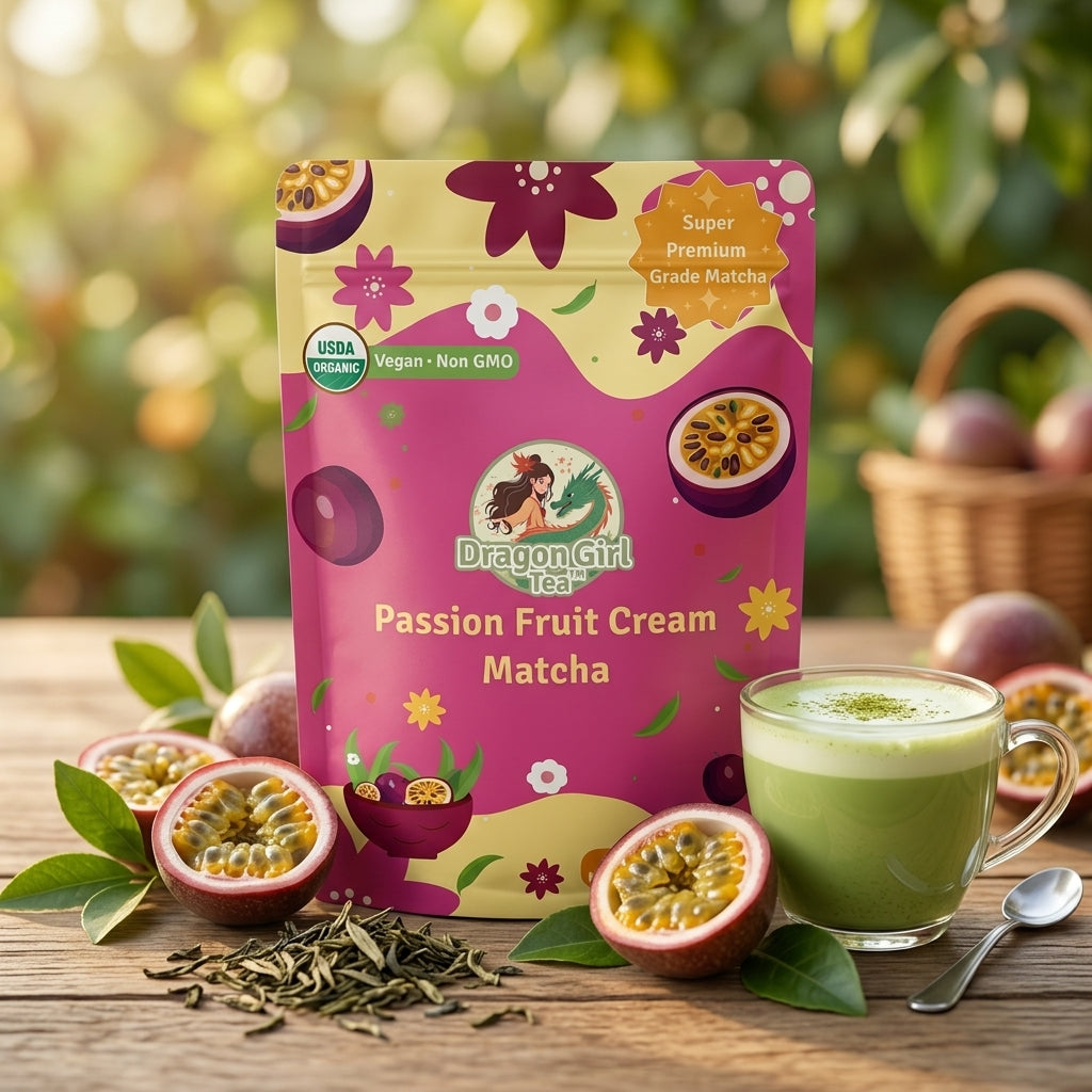 Dragon Girl Tea Passion Fruit Cream Matcha in a pink stand-up pouch, displayed on a wooden table with a glass of green matcha drink, dried tea leaves, and passion fruit halves in a garden setting.